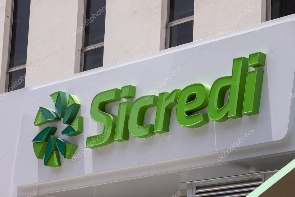 Sao Paulo, Brazil -  december 29 2019 - Logo of Sicredi, a brazilian cooperative of credit and development on Paulista avenue