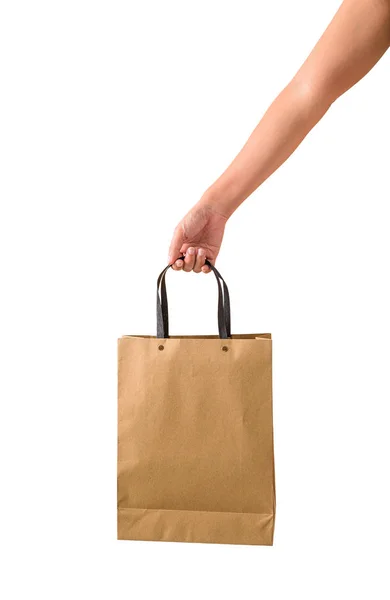 Žena ruka drží prázdné hnědé papaer nákupní tašky — Stock fotografie