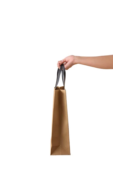 Žena ruka drží prázdné hnědé papaer nákupní tašky — Stock fotografie