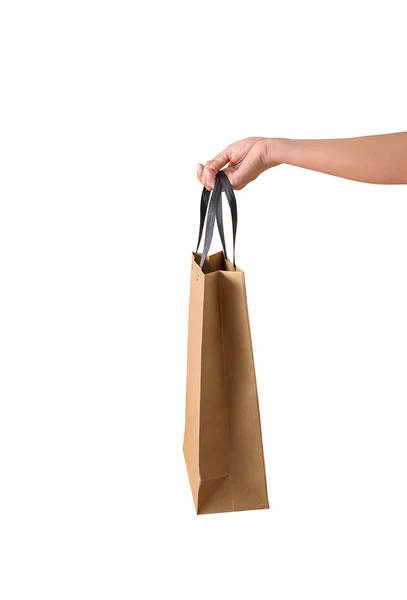 Vrouwelijke hand met blanco bruine papaver boodschappentassen — Stockfoto