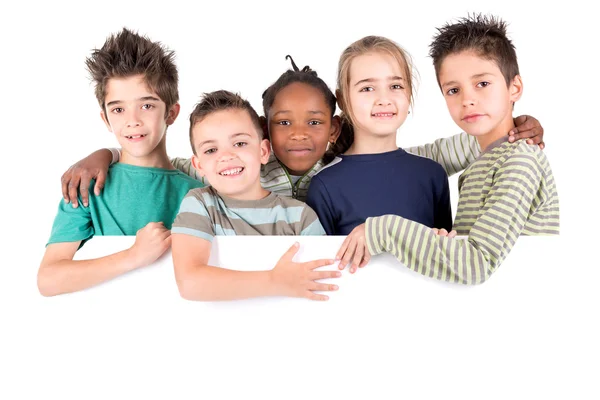 Group of children with blank board — Stock Photo, Image