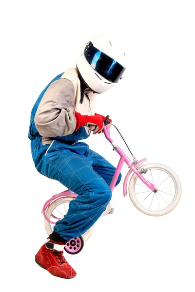 Racing driver with kid's bicycle — Stock Photo, Image