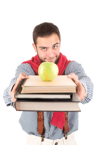 Nerd posando com livros e maçã — Fotografia de Stock