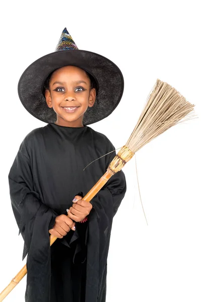 Joven bruja en Halloween — Foto de Stock