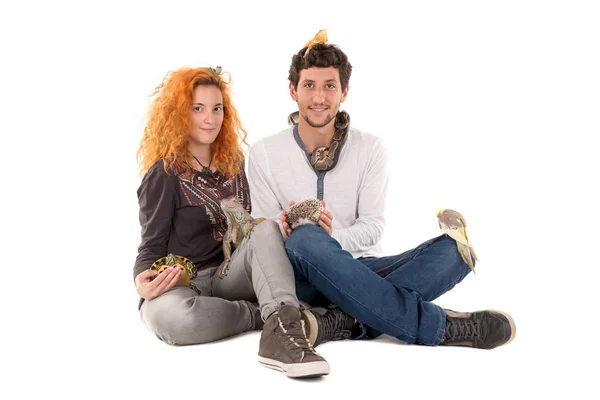 Young couple with pets — Stock Photo, Image