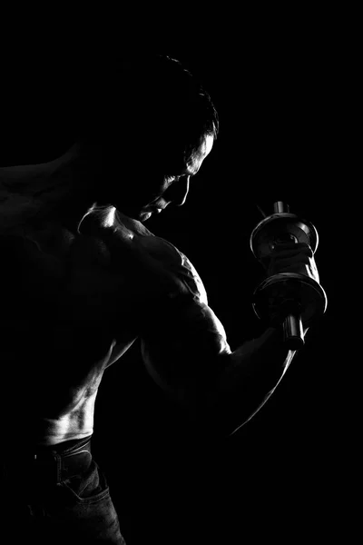 Hombre haciendo bíceps —  Fotos de Stock