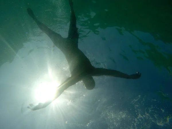 Drowning man silhouete — Stock Photo, Image