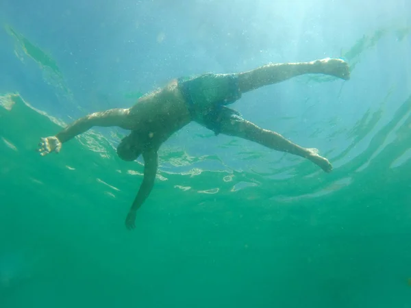 Drowning man silhouete — Stock Photo, Image