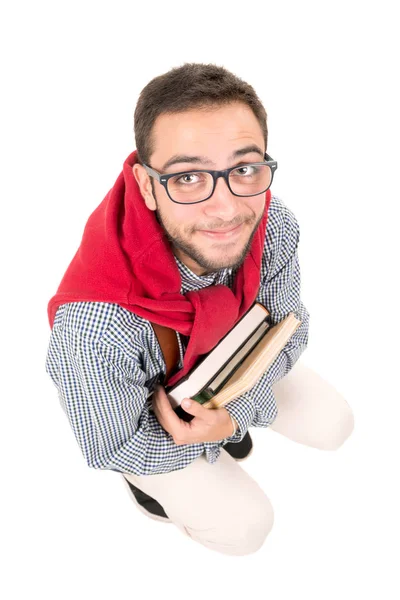 Nerd posiert mit Büchern — Stockfoto