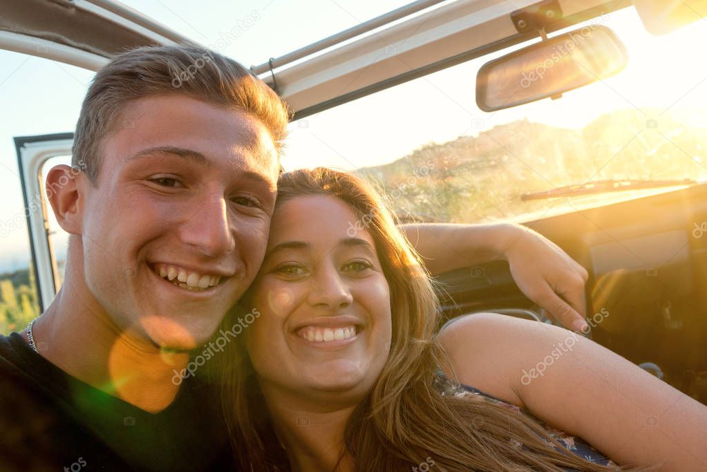 Happy couple in a car