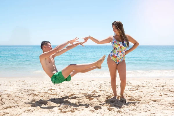 Girl pushing boy — Stock Photo, Image