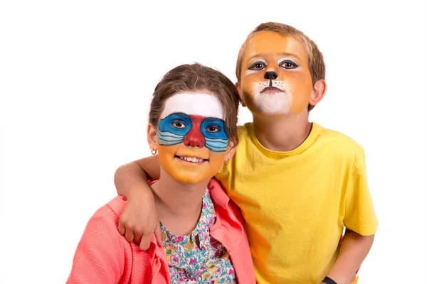 Niños con pintura facial —  Fotos de Stock