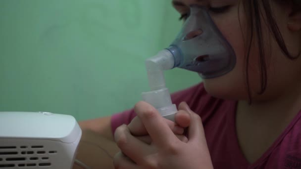 Teenage Girl Breathes Oxygen Mask Inhalation Respiratory Tract Mask Inhaler — Stock Video