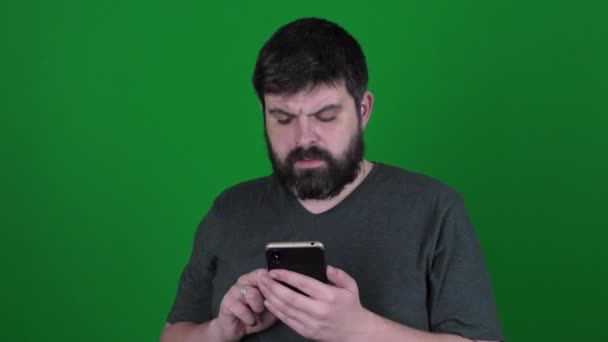 Bearded Man Communicates Skype Green Background Bearded Man Talking Video — ストック動画