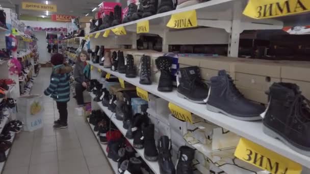 Europe Kiev Ukraine February 2020 Buyer Tries Sneakers Shoe Store — Stock video