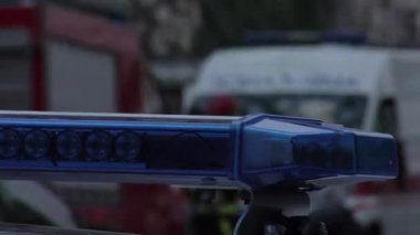 Europe, Kiev, Ukraine - March 2020: close-up of flashing lights of a special vehicle. Blue lights of police flashers and ambulances. Bokeh effect