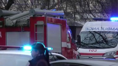 Europe, Kiev, Ukraine - March 2020: Close-up of special vehicle flashing lights. Blue lights of police flashers and ambulances.