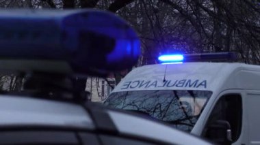 Europe, Kiev, Ukraine - March 2020: Close-up of special vehicle flashing lights. Blue lights of police flashers and ambulances.