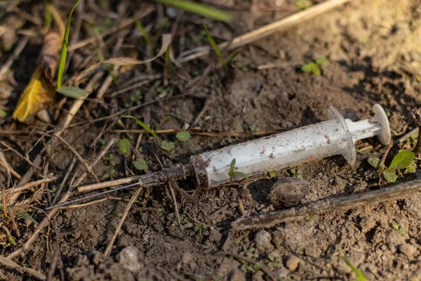 Used Syringe Blood Lies Ground Royalty Free Stock Images