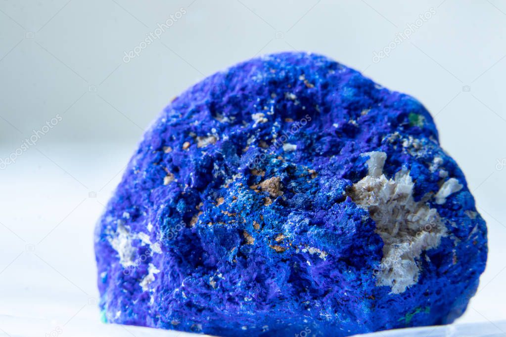 blue azurite mineral sample stone lies in the light, gemstone, quartz crystal