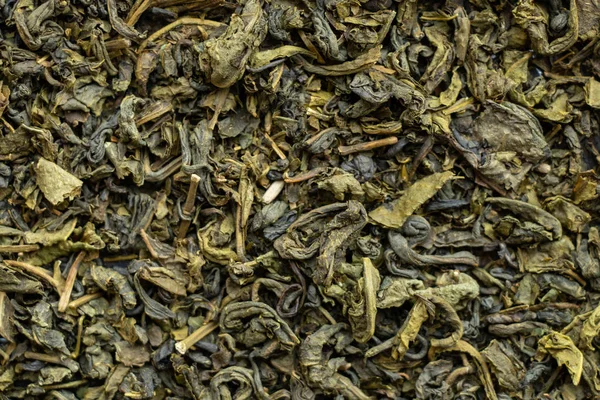 Зеленый чай крупным планом в качестве фона — стоковое фото
