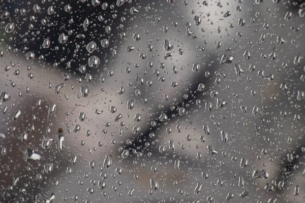 Kapky vody na skleněné okno po dešti jako pozadí — Stock fotografie