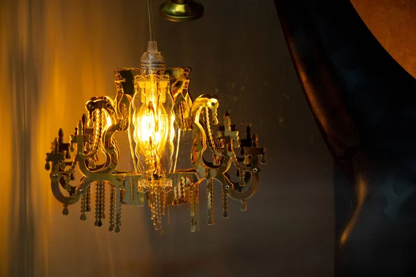 Beautiful old chandelier in the dark — Stock Photo, Image
