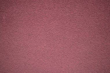 dusty pink house wall closeup as background