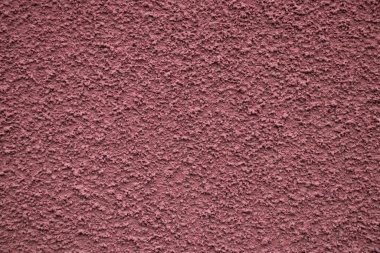 dusty pink house wall closeup as background