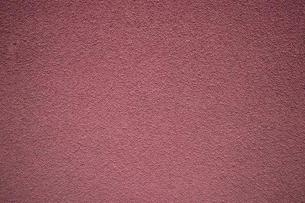 Poros rózsaszín ház fal közelkép, mint a háttér — Stock Fotó