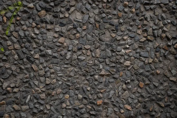 Muro de piedra de una casa como fondo — Foto de Stock