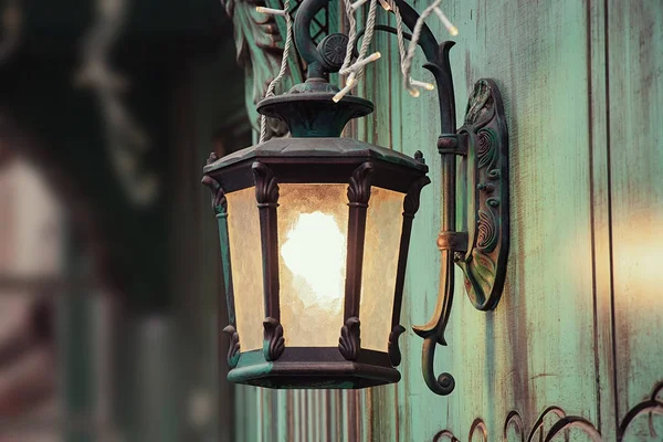 Old wrought iron lantern hanging on a house in the Dnieper city in Ukraine — Stock Photo, Image