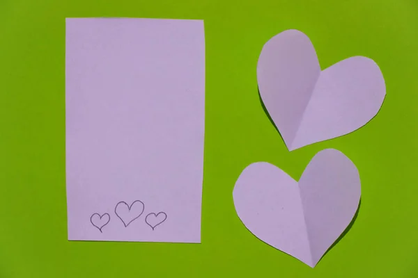 Paper cut out heart lies on paper, valentine — Stock Photo, Image