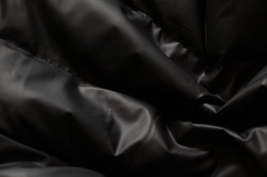 Siyah bir kabarık ceketin arkaplanı