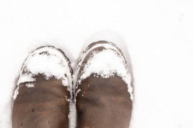 women's boots in the snow top view