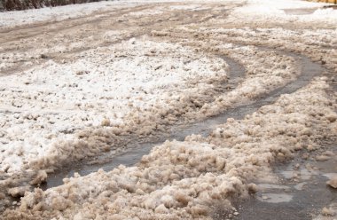 frozen snow from ice on a city street in winter in Ukraine