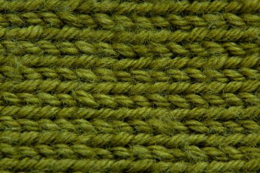 knitted green fabric sweaters closeup