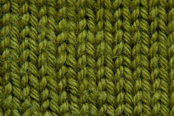 Knitted green fabric sweaters closeup — 스톡 사진