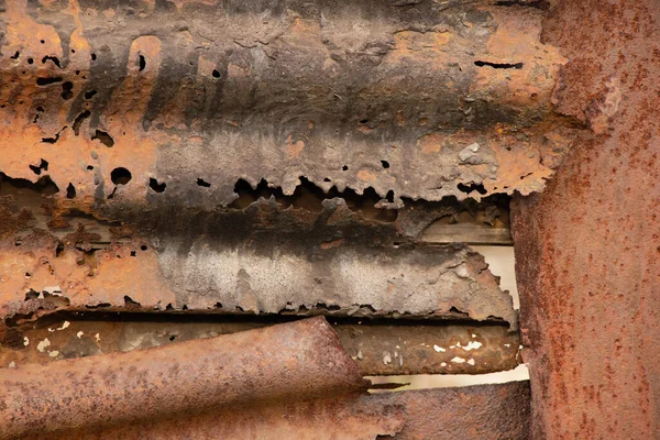 Rusty holey fence as background — 图库照片