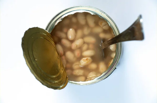 Tin can with white beans top view — Stock Photo, Image