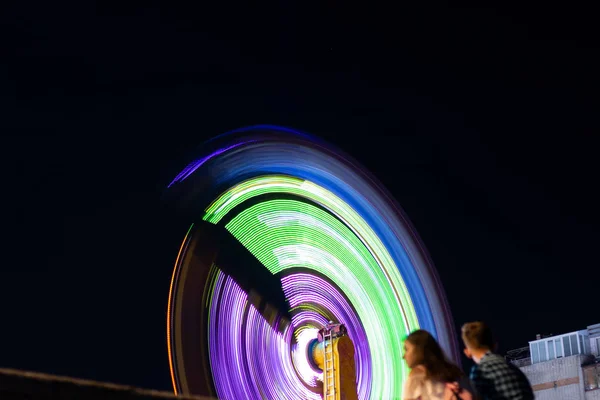 Swing in the parks in motion at night in Ukraine in the park — Stock Photo, Image
