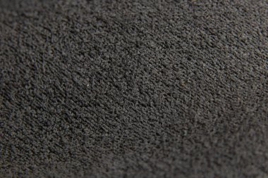 Örgü kumaştan kazakların koyu gri arka planı