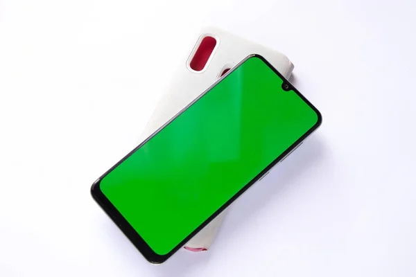 Telefon Mit Grünem Bildschirm Und Tasche — Stockfoto
