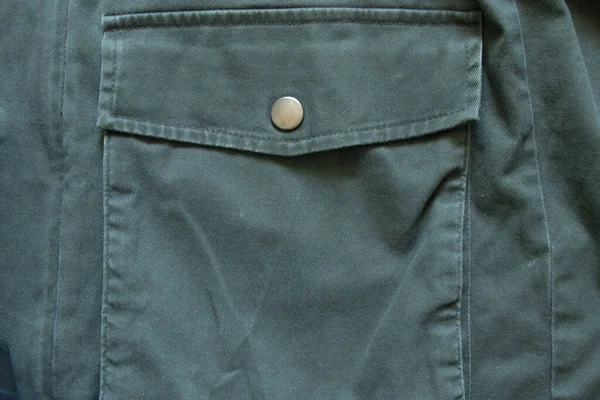 Tasche Auf Grünem Baumwollpullover Als Hintergrund Nahaufnahme — Stockfoto