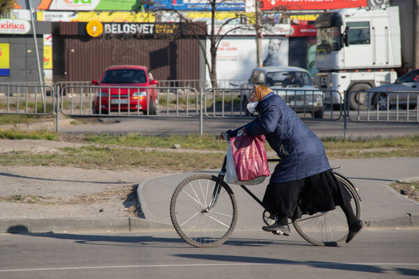 Ukraine, Dnipro - April 07, 2020. People of the Dnieper city during the morning quarantine on the street, failure to comply with quarantine norms according to the law of Ukraine