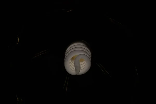 included energy-saving light bulb in the dark