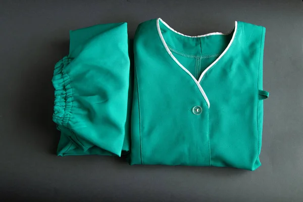 Conjunto Uniforme Médico Doblado Enfermera Fondo Aislada —  Fotos de Stock