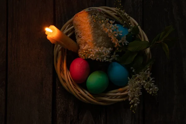 Easter Dinner Colored Chicken Eggs Candle Flame Old Wooden Table — Stock Photo, Image