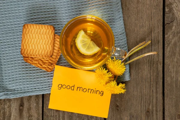 Een Kopje Thee Met Citroenpaardebloemen Woorden Het Engels Goedemorgen — Stockfoto