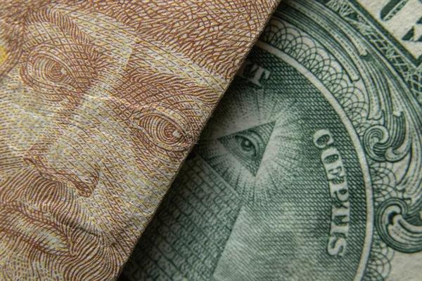 1ウクライナ グリブナと1米ドルを背景マクロとして — ストック写真